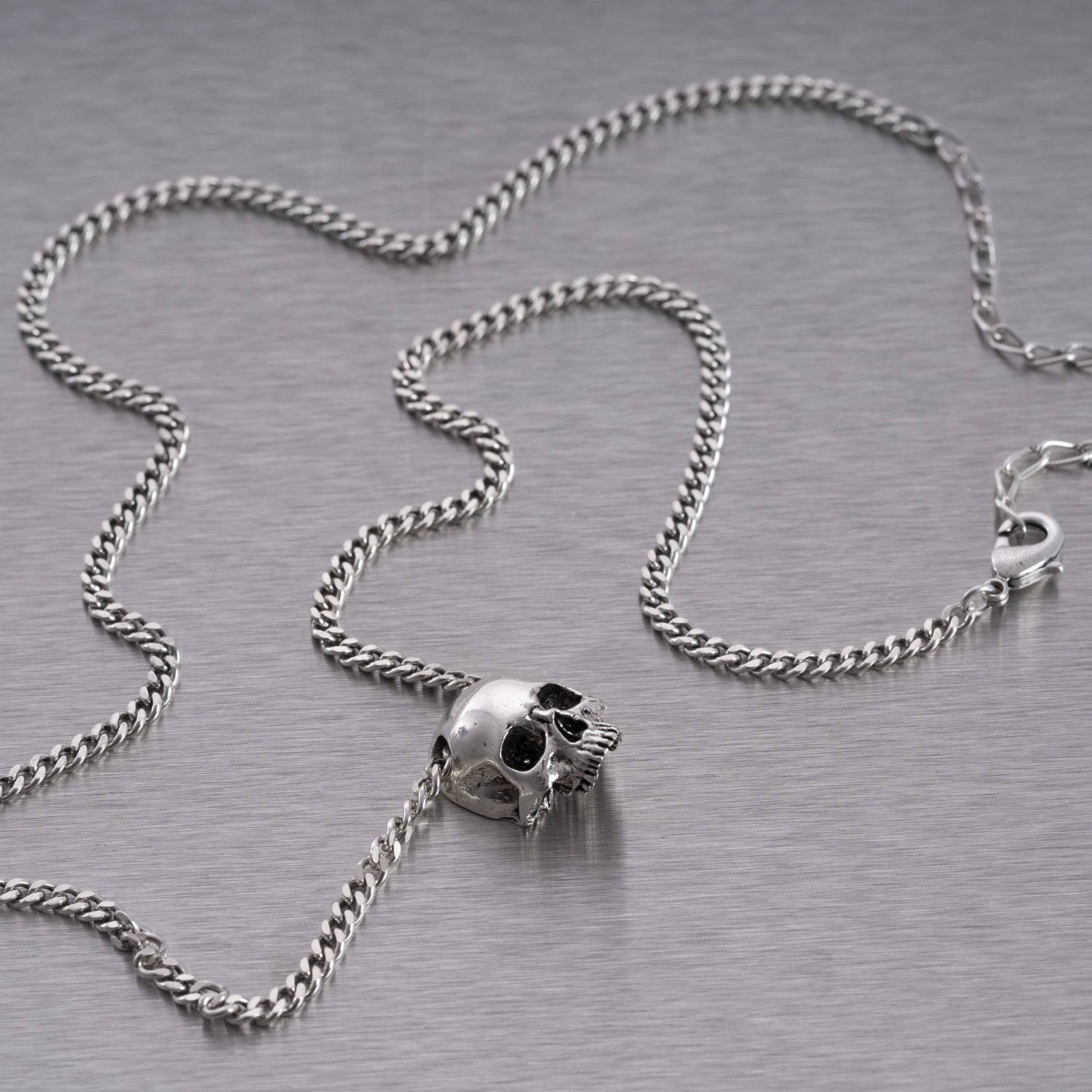 Buster and Punch Skull Pendant by Travis Barker | Panik Design